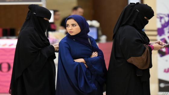 Saudi women queue outside the "convention hall" at Princess Noura bint Abdulrahman University in the Saudi capital Riyadh on October 6, 2016, ahead of a performance by US dance group iLuminate.
Saudi Arabia turned on its head Thursday night as what officials bill as a new era in entertainment begins for the conservative kingdom.
Hundreds of men and women, side-by-side, hooted their appreciation and clapped to the beat as New York's iLuminate danced their way into Saudi hearts. / AFP PHOTO / FAYEZ NURELDINE